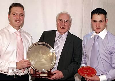 Raymond and Stephen Crawford receiving the shield for the best stock bull from NI Limousin Club President Mr John Gordon