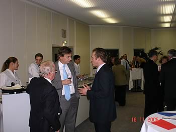 Raymond Crawford with Mr Hugh R. Mortimer, deputy head of mission from the British Embassy, Berlin, and Mr Jim Bloom, chairman of the technical committee of the British Limousin Cattle Society