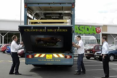 Crawfords making a delivery to Asda's Enniskillen branch under the guidance of store manager Peter Beckett.