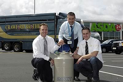 Crawfords making a delivery to Asda's Enniskillen branch under the guidance of store manager Peter Beckett.