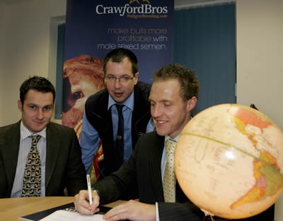 Raymond signing a deal that was secured at 1am to New Zealand